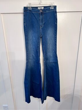 Free People Just Float On Flare Jeans in a dark blue bell bottoms size 25